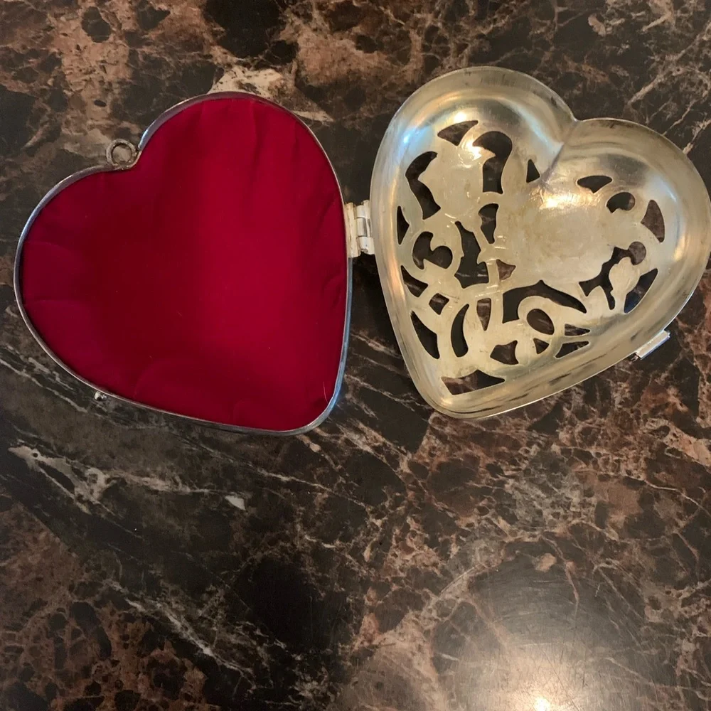 Silver plated hinged heart shaped trinket box with red lining